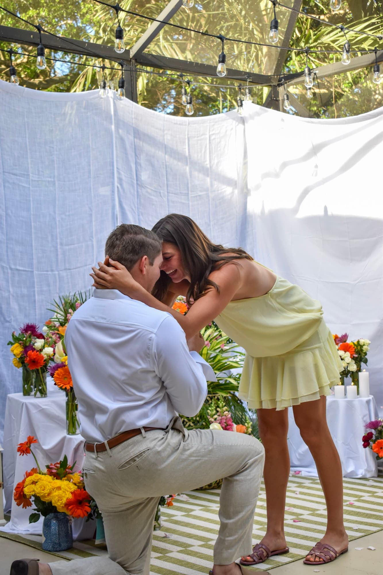 Morgan pulling Jon up into a kiss, his hand still on her waist.